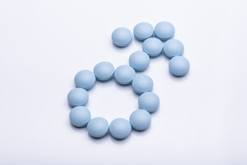 Male Gender Symbol Made From Blue Pills