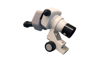 The image of the professional laboratory microscope isolated under the white background