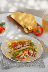 Mexican pork tacos with vegetables. Delicious tacos