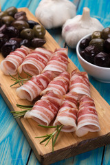 Rolls of pancetta bacom