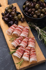 Rolls of pancetta bacom