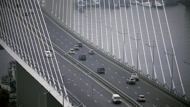 Vladivostok, Primorsky Krai / Russia - 07 07 2017: Close-up of a road junction, cars driving on the Golden Bridge