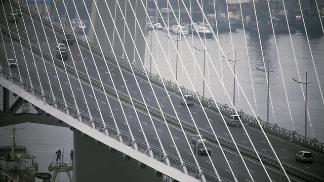 Vladivostok, Primorsky Krai / Russia - 07 07 2017: Close-up of a road junction, cars driving on the Golden Bridge