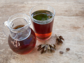 black coffee and lemon tea on wood table summer drink