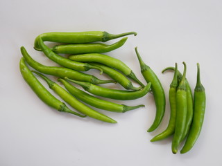 green chili pepper organic vegetable isolated white background