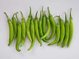 green chili pepper organic vegetable isolated white background