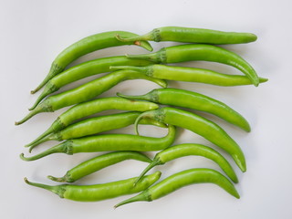 green chili pepper organic vegetable isolated white background