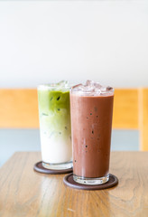iced chocolate and iced matche green tea on wood table