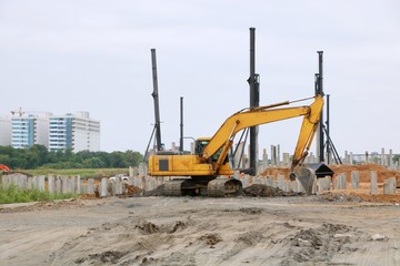 Machine used for building foundation work in large construction site at Thailand, Space for text in template
