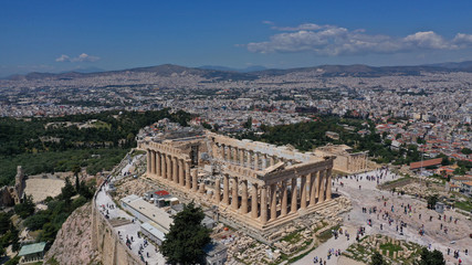 Naklejka premium Aerial birds eye view photo taken by drone of iconic Acropolis hill and the Parthenon, Athens historic center, Attica, Greece