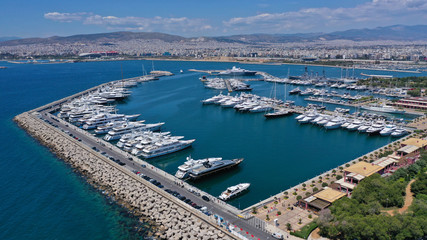Fototapeta premium Aerial drone panoramic photo of famous Flisvos Marina with mega yachts and sail boats docked, Athens riviera, Attica, Greece
