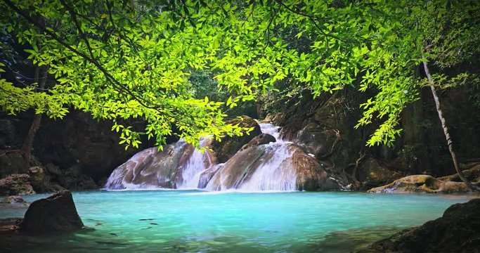 Tranquil serene nature. Waterfall cascade in Thailand jungle forest