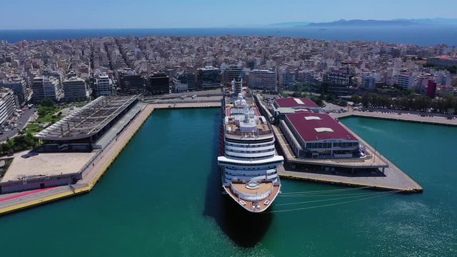 Aerial drone video of busy port of Piraeus, the largest in Greece and one of the largest passenger ports in Europe, Attica, Greece 