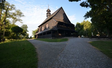 Fototapeta na wymiar St.-Rochus wooden Roman Catholic Church in Dobrzen Wielki, district Opole was built in 1658, rebuilt in 1752 (and restored several times 1928/1958/2006) from July 6, 2014, Poland