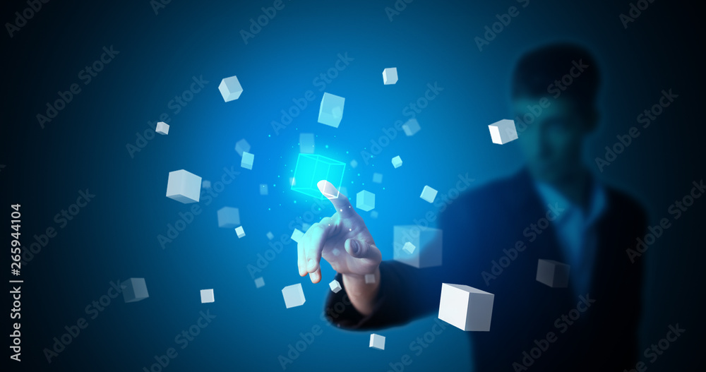 Aufkleber Man touching hologram screen displaying cube symbols
