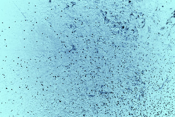 Vintage blue background. Rough painted wall of sapphire color. Imperfect plane of blue colored. Uneven old decorative toned backdrop of cyan tint. Texture of sapphirine hue. Ornamental stony surface.