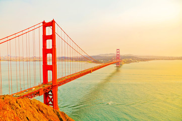 View of Golden Gate Bridge in San Francisco at sunset.