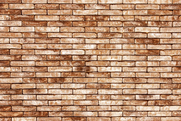 Brown grunge rustic brick wall texture.