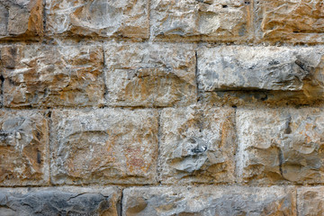 background of wall of large protruding stones