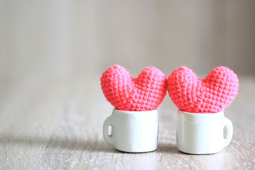 Handmade crochet heart in the white cup for valentines day