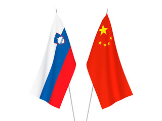 National fabric flags of China and Slovenia isolated on white background. 3d rendering illustration.