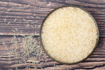 A glass bowl with white long-grain rice