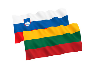 Obraz premium National fabric flags of Slovenia and Lithuania isolated on white background. 3d rendering illustration. 1 to 2 proportion.