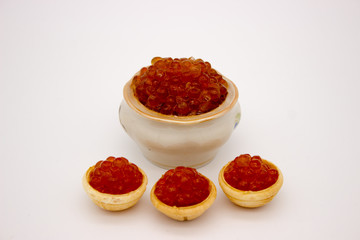 Luxury Red Caviar in the bowl. Food photo concept.