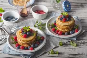 Pancakes with forest fruit sauce