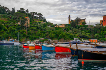 Fototapeta na wymiar Amazing colorful mediterranean landscape, fantastic panorama of Portofino touristic village on Liguria coast, Italy, Europe. Postcard of Portofino. Travel and vacation concept.