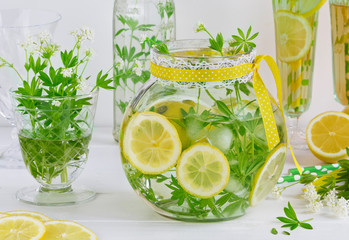 Summer drink blooming woodruff with lemon drink