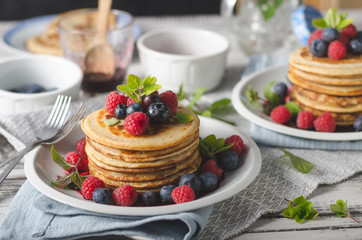 Pancakes with forest fruit sauce