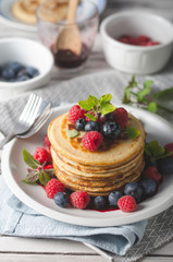 Pancakes with forest fruit sauce