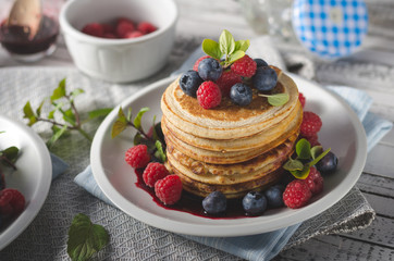 Pancakes with forest fruit sauce