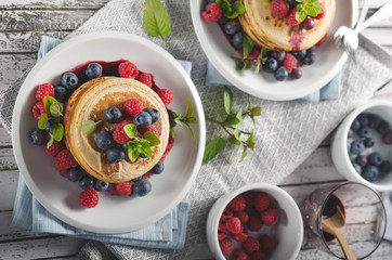 Pancakes with forest fruit sauce