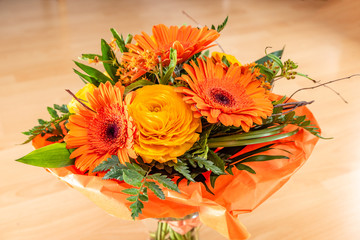 flower bouquet for mothers day against wooden background
