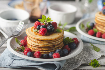 Pancakes with forest fruit sauce