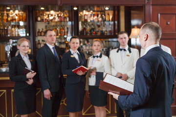 briefing staff in hotel and restaurant.