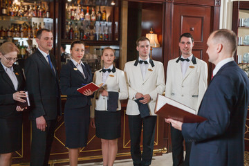 briefing staff in hotel and restaurant.
