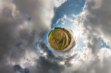 Little planet spherical panorama 360 degrees. Spherical aerial view in field in nice day with...