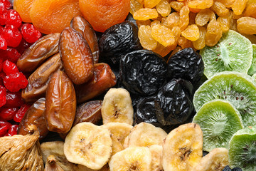 Different dried fruits as background, top view. Healthy lifestyle