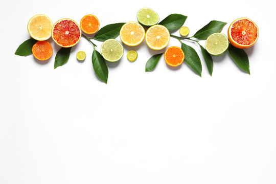 Flat Lay Composition With Different Citrus Fruits On White Background