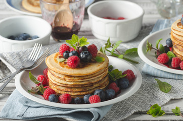 Pancakes with forest fruit sauce