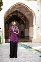 iranian lady in Fin gardens in Kashan, Iran