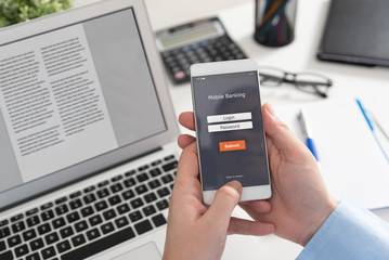 Man using mobile banking on smartphone