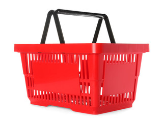 Fototapeta premium Color plastic shopping basket on white background