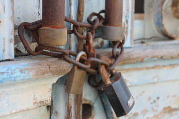 antique padlock on an old door