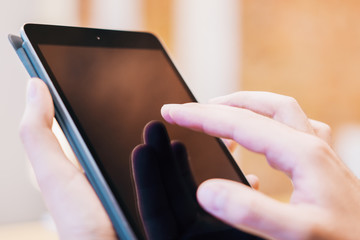 Sideview of man using pad