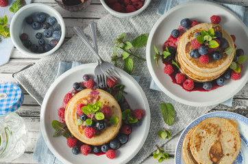 Pancakes with forest fruit sauce