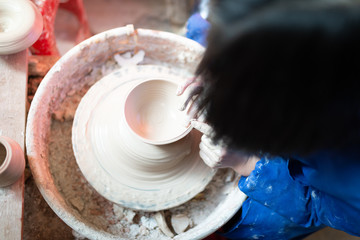 Potter making a vase